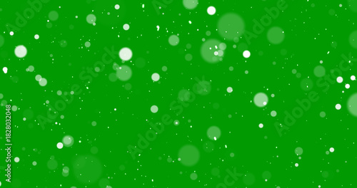 Realistic snow dust particle background, green screen super smooth fx. Overlay classic snowfall, blizzard-like. Snow falling green screen winter background. Flurry start snowflake storm particles.
