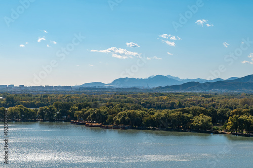 The natural scenery of Kunming Lake and distant mountains in Beijing