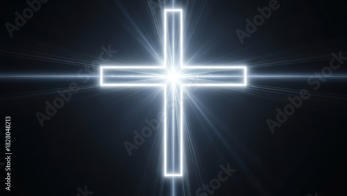Glowing cross with light rays against a dark black background view