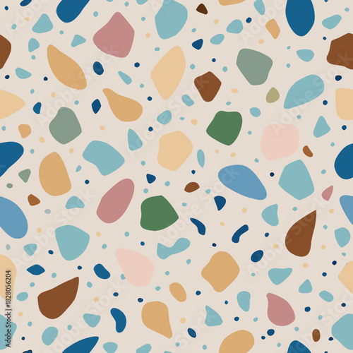 Abstract terrazzo pattern with pastel and earthy tones scattered across a light background