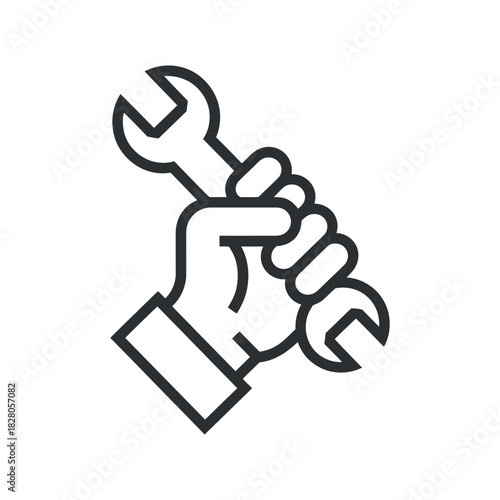 Hand Holding Wrench Symbolizing Repair or Mechanical Service