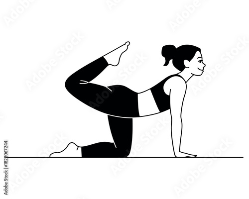 A woman in athletic wear performs a yoga pose on a mat.