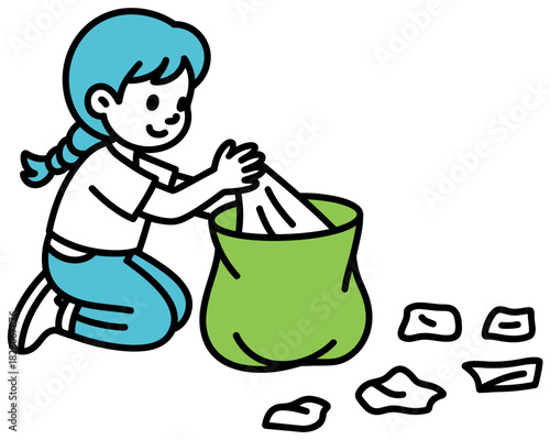 A child is cleaning up trash and putting it in a green bag.