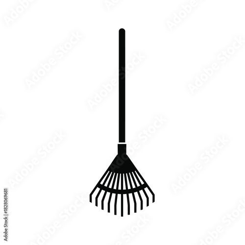 Black silhouette of a garden rake on white background