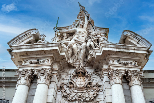 Fototapeta The Military Museum’s facade with the sculpture in the main entrance featuring an allegorical group representing The Fatherland, by Teixeira Lopes, flanked by Corinthian columns, Lisbon, 2023
