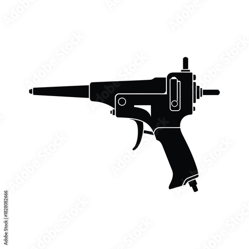 Black silhouette of a vintage staple gun tool
