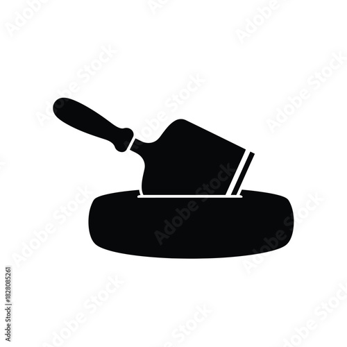 Black silhouette of cheese cutter slicing cheese slice
