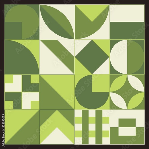 A green and white patterned quilt with various shapes and designs
