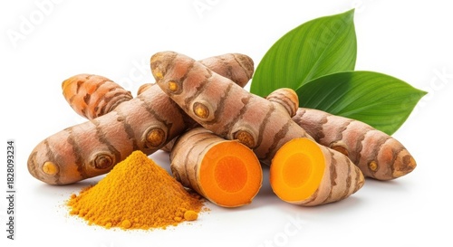 Fresh organic turmeric roots and powder with green leaves isolated on white background
