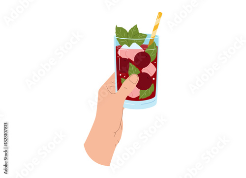 A hand holds a red cherry drink