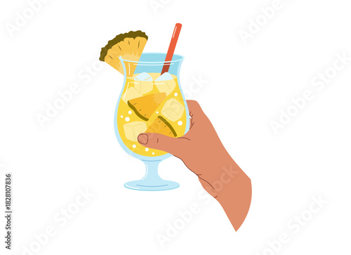 A hand holds a yellow pineapple drink