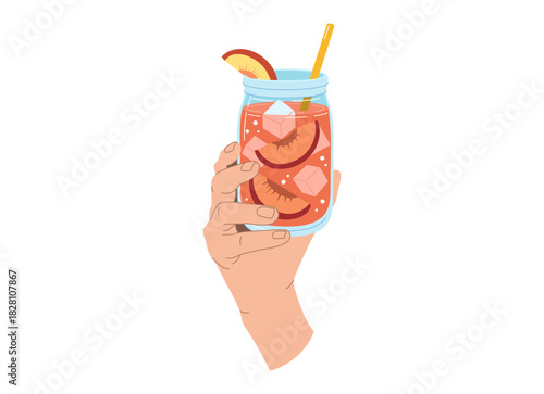 A hand holding a peach drink