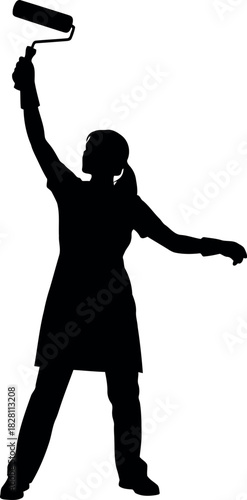 Silhouette of a person painting an interior wall with a paint roller.