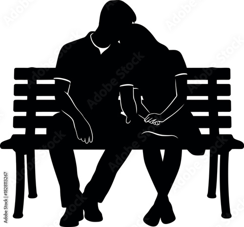 Silhouette of a loving couple sitting on a bench holding hands.