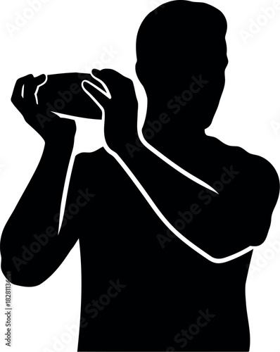 Silhouette of a bartender shaking a cocktail shaker for drinks