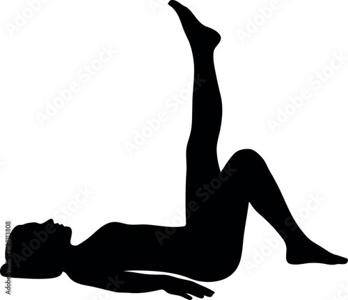 Silhouette of person doing leg raise exercise, fitness workout