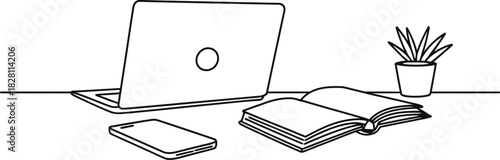 A desk setup includes a laptop, a smartphone, an open book, and a potted plant.