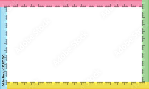 黒いインチのメモリが入った4色のカラフルな定規に囲まれたフレーム