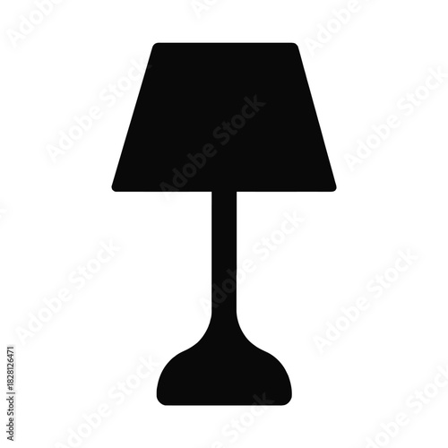 Black silhouette of a table lamp with a conical shade on a white background light