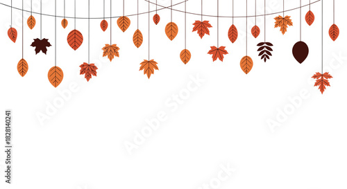 Festive hanging garland of colorful autumn leaves in warm fall tones isolated on a white background with copy space.
