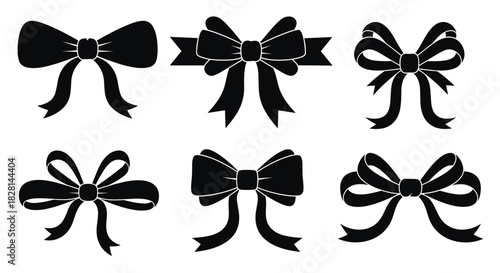 A set of six decorative black bow silhouettes with flowing ribbons for gift wrapping and celebration design elements isolated.