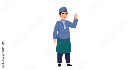 Cheerful muslim boy wearing traditional clothing including a cap and sarong smiling and waving his hand in a friendly gesture.