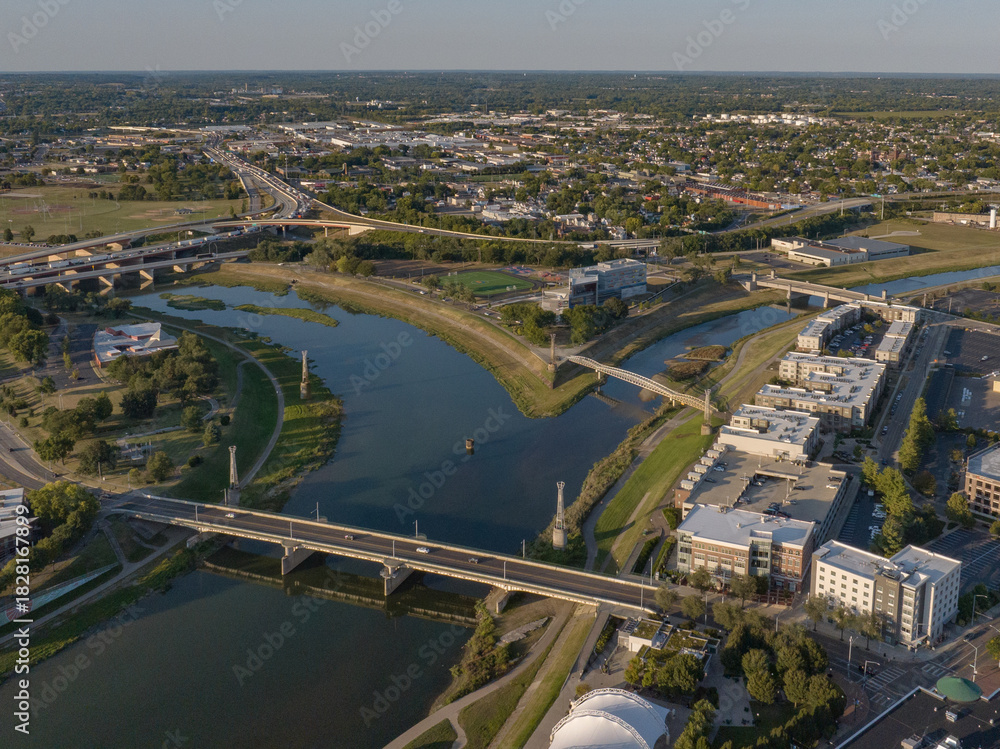 custom made wallpaper toronto digitalAerial view of the confluence of rivers, with bridges spanning the waterways and buildings lining the banks, reflecting the sky in the water, Dayton, OH, United States.