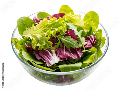 Fresh mixed greens salad in a clear glass bowl