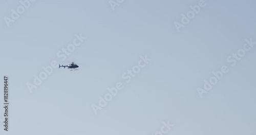 Panning shot with helicopter as it flys toward New York city skyscrapers