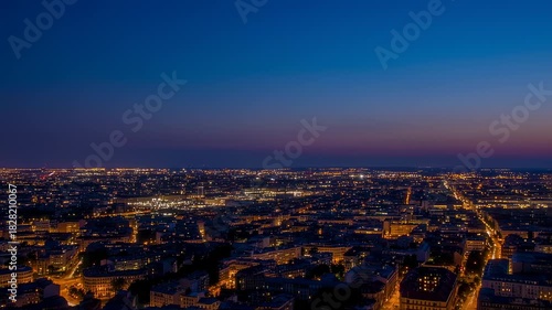 Cityscape Aerial View at Dusk: Captivating Urban Skyline with Twinkling Lights