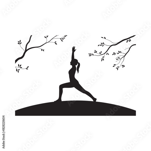 Silhouette of a woman practicing yoga outdoors under trees