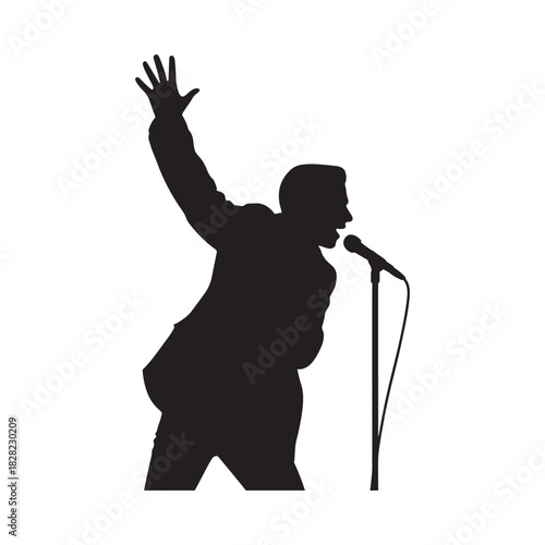 Silhouette of a singer performing on stage with microphone