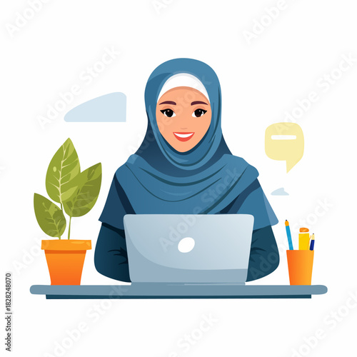 Woman in hijab using laptop at desk.