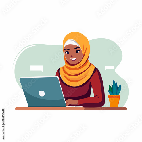 Hijab Wearing Woman Using Laptop at Desk.