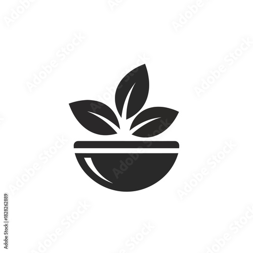 Simple bowl with three leaves, representing freshness and natural elements.