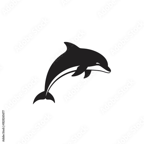 Silhouette of a Dolphin Leaping Gracefully from the Water.