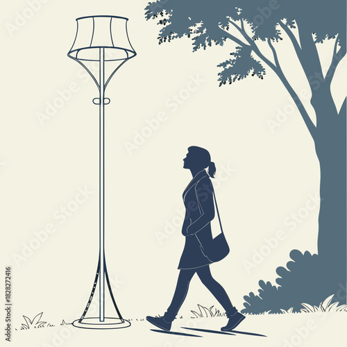 Silhouette of a woman walking past a tall decorative lamp post under a large tree with dappled sunlight and green grass