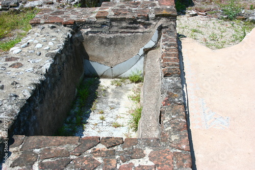 Ancient stone cistern or trough within archaeological ruins, July, 2008