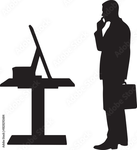 A thoughtful businessman in a suit stands contemplating information on a computer kiosk, representing a moment of critical decision-making