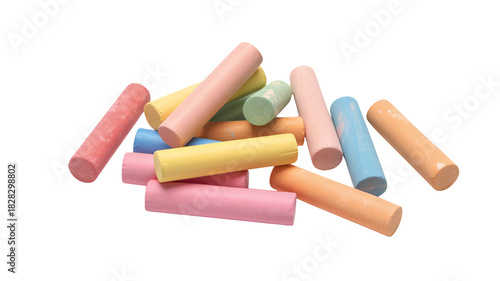 Vibrant chalk sticks scattered, perfect for creative projects and education