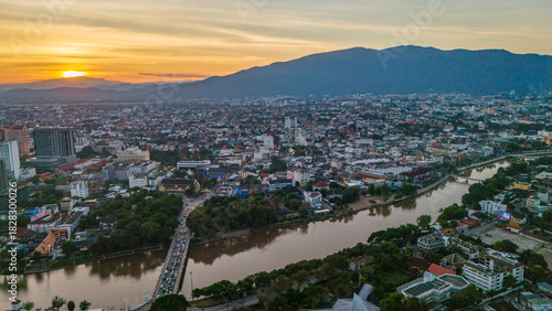 Photography drone aerial sunset of Chiang Mai Thailand cityscape old town temples mountains