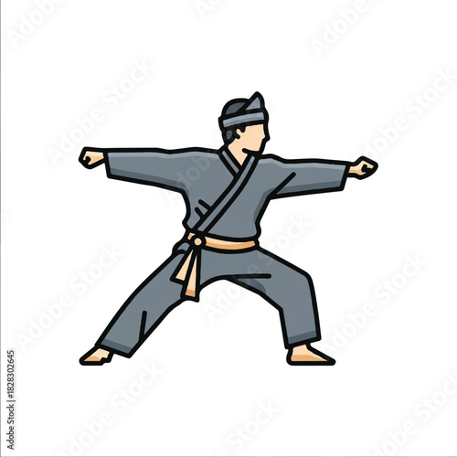 Martial arts practitioner in a grey uniform performing a defensive stance