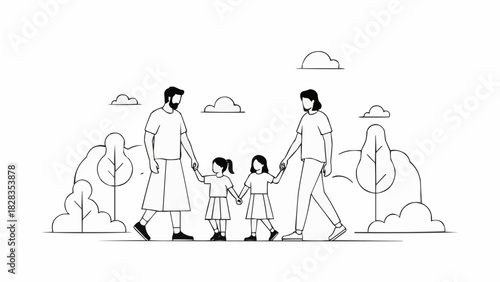 Family walking together holding hands in a park.