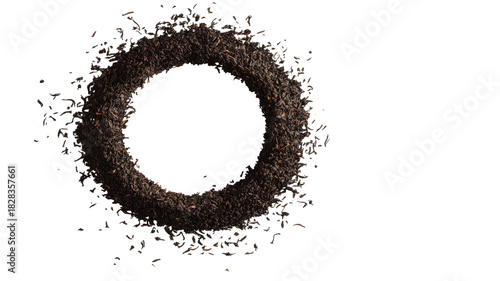 Pile of dry black tea leaves with rich aromatic texture loose leaf beverage ingredient natural dark blend isolated on white background
