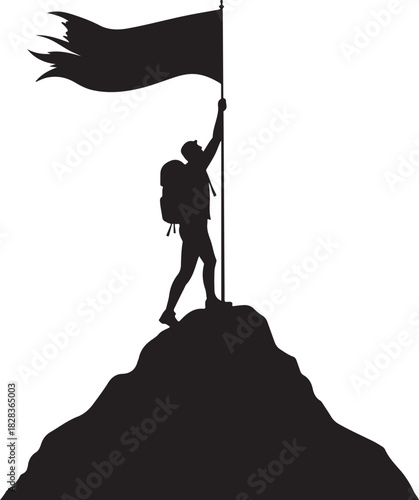 Silhouette of hiker planting flag on mountain peak