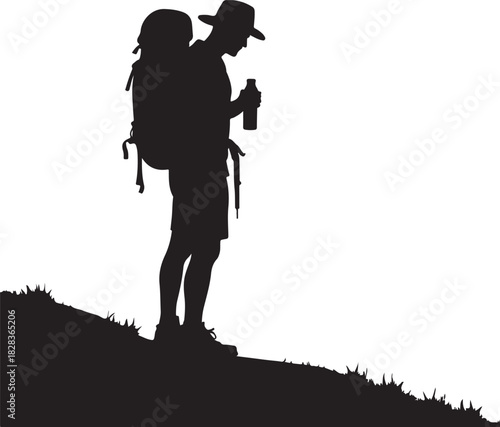 Silhouette of hiker with backpack holding water bottle on grassy slope