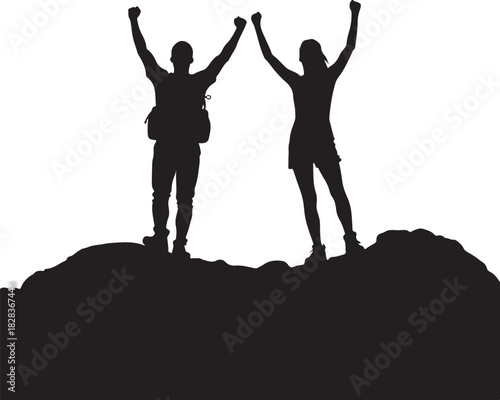 Two hikers celebrate victory on mountain peak silhouette