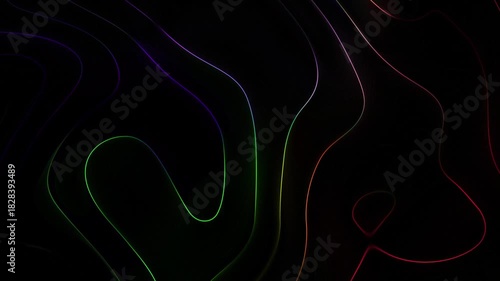 Abstract flowing lines of color on a dark background.