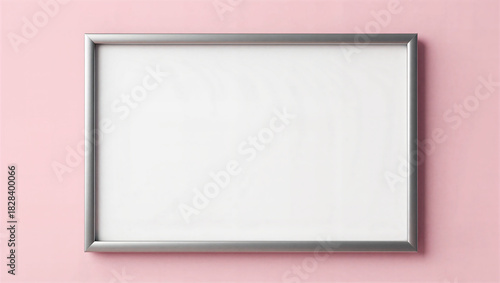 Blank silver picture frame mockup with empty white space against a soft pink background, top view