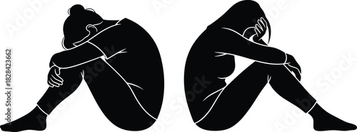 Sad silhouette of two people sitting back to back in emotional distress, depression, loneliness, mental health, grief, and anxiety